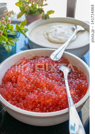 Traditional Indonesian bubur mutiara with vibrant tapioca pearls and creamy bubur sumsum. Perfect for culinary, restaurant, hospitality, travel, and Southeast Asian food concepts. 141714868