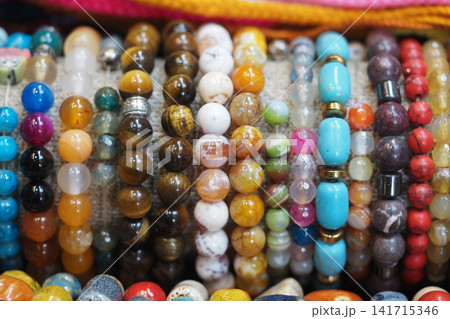 Colorful beads displayed in a market stall Colorful beads displayed in a market stall 141715346