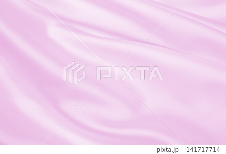 Smooth elegant pink silk or satin texture as wedding background. Luxurious background design 141717714