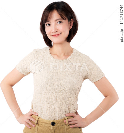 Asian woman portrait smile beige shirt isolated transparency background with hands on hips and confident expression Asian woman portrait smile beige shirt isolated transparency background with hands on hips and confident expression 141718744