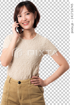 Asian woman portrait phone smile beige shirt showing cheerful confidence against isolated background for lifestyle concept Asian woman portrait phone smile beige shirt showing cheerful confidence against isolated background for lifestyle concept 141718745