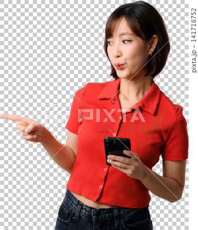 Asian woman smartphone pointing red shirt holding phone and gesturing with curious expression against isolated background Asian woman smartphone pointing red shirt holding phone and gesturing with curious expression against isolated background 141718752