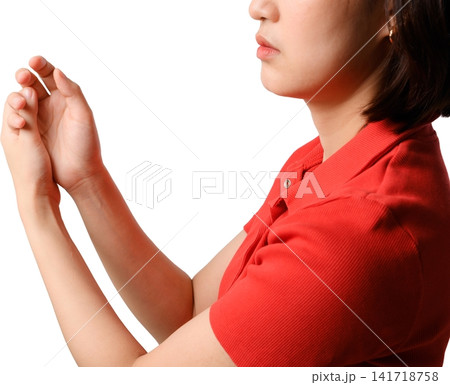 Asian woman red shirt hand gesture isolated profile against transparency background, focused female with raised arms Asian woman red shirt hand gesture isolated profile against transparency background, focused female with raised arms 141718758