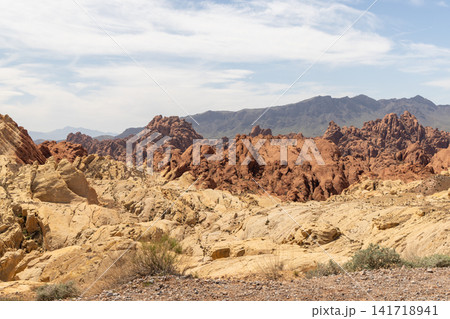 Red sandstone desert cliffs with blue sky dramatic rock landscape Red sandstone desert cliffs with blue sky dramatic rock landscape 141718941