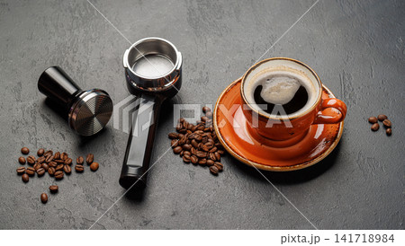 Espresso preparation tools and coffee beans flat lay composition Espresso preparation tools and coffee beans flat lay composition 141718984