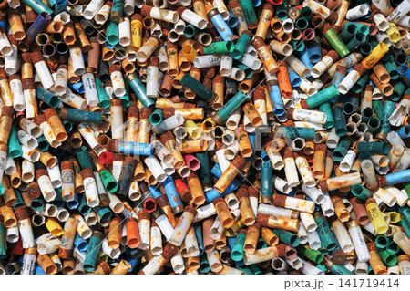 Pile of colorful plastic pipes for recycling, closeup of photo Pile of colorful plastic pipes for recycling, closeup of photo 141719414