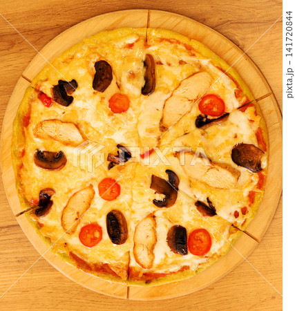 pizza on wood background 141720844