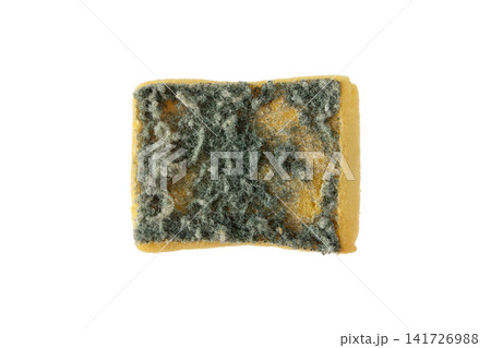 Worn kitchen sponge with scrubber isolated on white background top view Worn kitchen sponge with scrubber isolated on white background top view 141726988