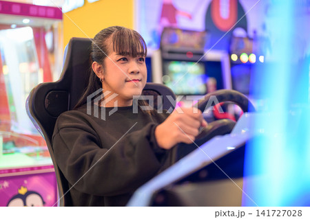 Woman Driving Arcade Racing Simulator Machine Woman Driving Arcade Racing Simulator Machine 141727028