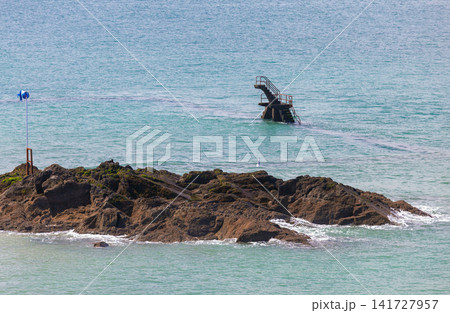 Diving Platform of Public Seawater Pool at High Tide in Saint Malo France Diving Platform of Public Seawater Pool at High Tide in Saint Malo France 141727957