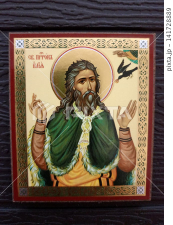 Orthodox icon depicting the Holy Prophet Elijah with a raven Orthodox icon depicting the Holy Prophet Elijah with a raven 141728889