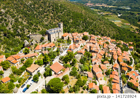 Panoramic view from above on the city Eus. Small town located on high mountain. Eastern Pyrenees Panoramic view from above on the city Eus. Small town located on high mountain. Eastern Pyrenees 141728924