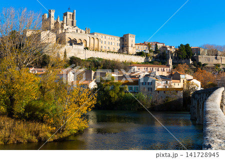 The Saint Nazaire Cathedral and Pont Vieux in Beziers The Saint Nazaire Cathedral and Pont Vieux in Beziers 141728945