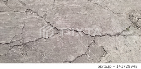 Cracked and Weathered Concrete Surface Texture Cracked and Weathered Concrete Surface Texture 141728948