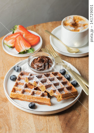 Belgium waffles Homemade waffles with strawberries Belgium waffles Homemade waffles with strawberries 141729001