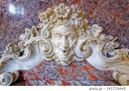 Ornate marble basin with a carved mythological mask water spout at Waddesdon Manor Ornate marble basin with a carved mythological mask water spout at Waddesdon Manor 141729448