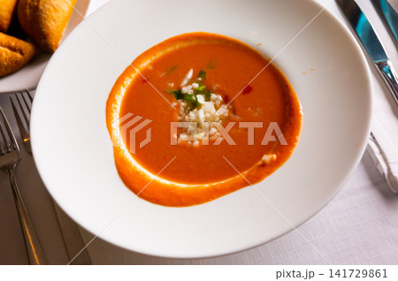 Spanish dish Gazpacho, made from tomato puree, is served with croutons Spanish dish Gazpacho, made from tomato puree, is served with croutons 141729861