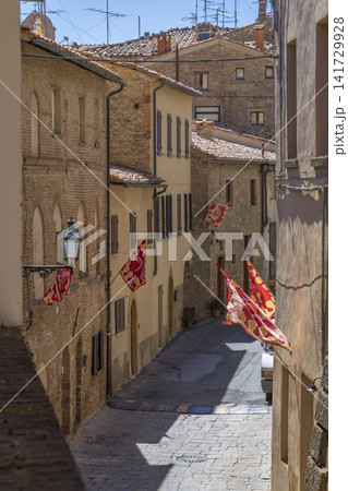 Castiglion Fiorentino street with traditional italian flags Castiglion Fiorentino street with traditional italian flags 141729928