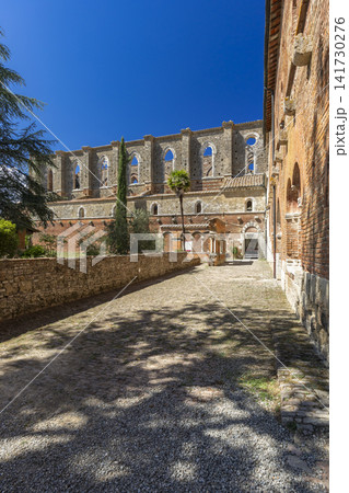 San Galgano Abbey ruins under clear Tuscany sky 141730276