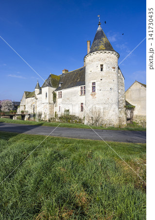 Chemery castle with a turret against blue sky Chemery castle with a turret against blue sky 141730435