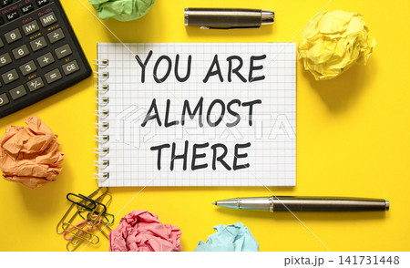 You are almost there words symbol. Concept words You are almost there on beautiful white note. Beautiful yellow background. Business You are almost there motivational support concept. Copy space. You are almost there words symbol. Concept words You are almost there on beautiful white note. Beautiful yellow background. Business You are almost there motivational support concept. Copy space. 141731448