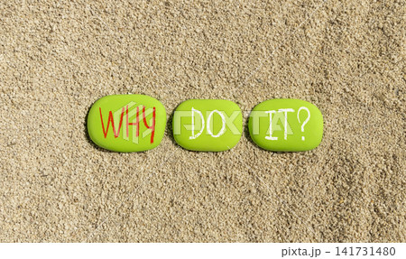 Why do it words symbol. Concept words Why do it on beautiful green stones. Beautiful sand background. Business support motivational and Why do it concept. Copy space. Why do it words symbol. Concept words Why do it on beautiful green stones. Beautiful sand background. Business support motivational and Why do it concept. Copy space. 141731480
