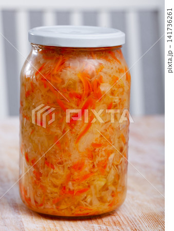 Homemade sauerkraut in glass preserving jar, fermented food Homemade sauerkraut in glass preserving jar, fermented food 141736261