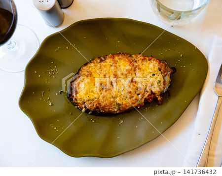 Fresh stuffed eggplant served on dining table Fresh stuffed eggplant served on dining table 141736432