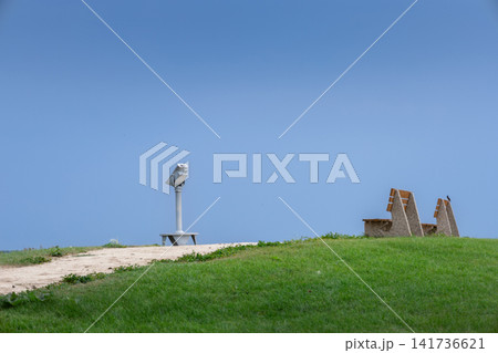 Scenic Wetland Observation Telescope Under Stormy Sky Scenic Wetland Observation Telescope Under Stormy Sky 141736621