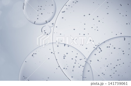 Blue water gel drops texture 3d background, cosmetic liquid circle pattern with bubbles. Face cleanser, hyaluronic acid serum, aqua collagen jelly cream, skin care moisture body wash. 3D illustration 141739061