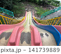 レトロな滑り台が並ぶ無人の児童公園 神戸 141739889