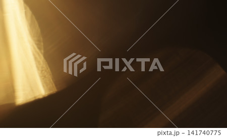 real lens flare from back sunlight over dark background for overlay 141740775