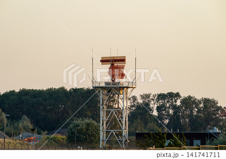 Airport Radar Tower Against the Treeline Airport Radar Tower Against the Treeline 141741711