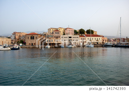 Historic Chania Harbour Reflected in Calm Water Historic Chania Harbour Reflected in Calm Water 141742393