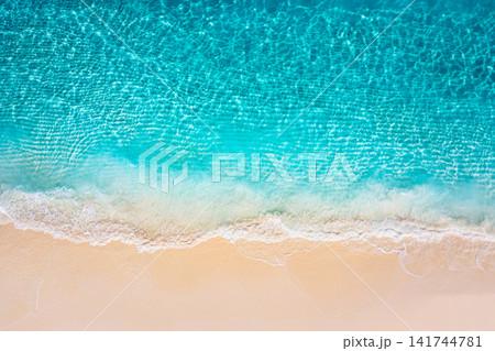 Ethereal ocean from above turquoise water blending into powdery shore tropical crystal clear abstract. Perfect summer travel seascape minimal design. Calm outdoors wellness copy space scenic 141744781