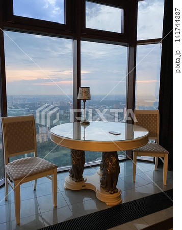 Elegant interior with round table and chairs Elegant interior with round table and chairs 141744887