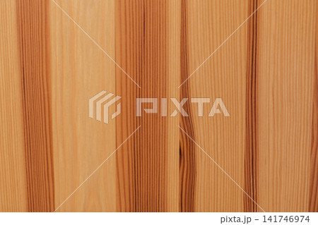 Texture of wooden boards with longitudinal grain, smooth color transitions and the natural structure of organic material. 141746974