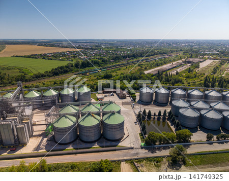 Drone View of Agroindustrial Complex with Grain Silos and Water Reservoir Drone View of Agroindustrial Complex with Grain Silos and Water Reservoir 141749325