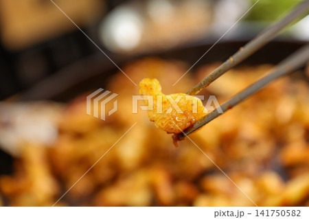 Spicy Korean Chicken Stir Fry Dakgalbi with Vegetables on Iron Pan 141750582
