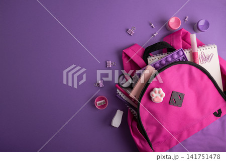 Pink backpack with school supplies Pink backpack with school supplies 141751478