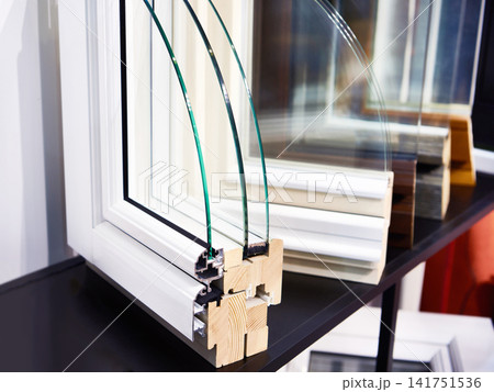 Modern wooden triple glazed windows in section 141751536