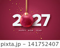 White 2027 numbers with glittering red Christmas ornament and gold confetti on burgundy background 141752407