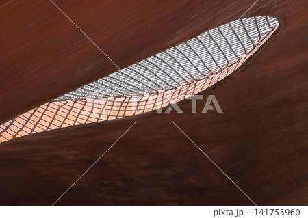 Abstract view of a rusted metal structure with rope netting Abstract view of a rusted metal structure with rope netting 141753960