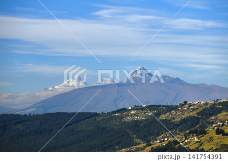 The Illinizas and El Corazon Volcano at Dawn in the Ecuadorian Andes The Illinizas and El Corazon Volcano at Dawn in the Ecuadorian Andes 141754391
