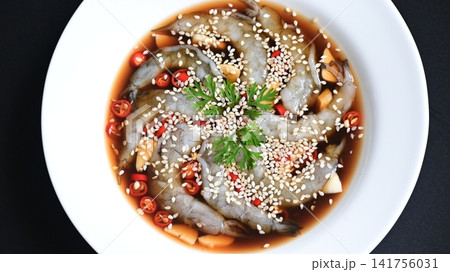 shrimp in soy sauce on white plate, korean style menu 141756031