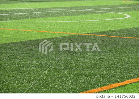 artificial green grass background for playground 141756032