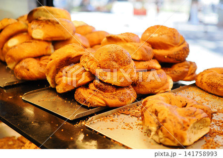 Fresh baked bread rolls at a local bakery in the morning Fresh baked bread rolls at a local bakery in the morning 141758993