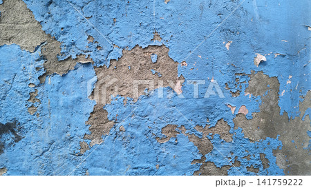 Close view of peeling blue wall with texture details 141759222
