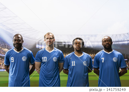 Diverse soccer players team stand together in stadium lineup before game, confident pose with hands behind backs. Ready to play footballers with team spirit, squad unity. 141759249