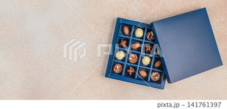 Luxury Assorted Chocolates in Blue Gift Box with Copy Space Top View Luxury Assorted Chocolates in Blue Gift Box with Copy Space Top View 141761397